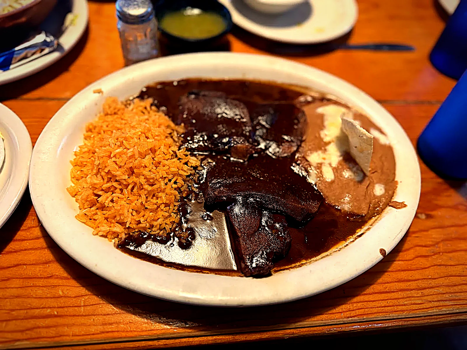 Mole poblano plate with rice and refried beans at Dominguez